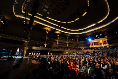 A theatre full of spectators.