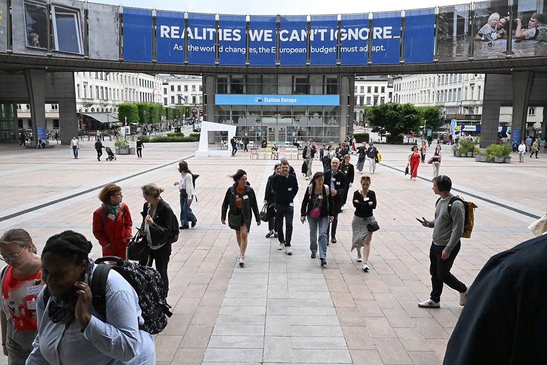 Group of people walking on the esplanade of the European Parliament 